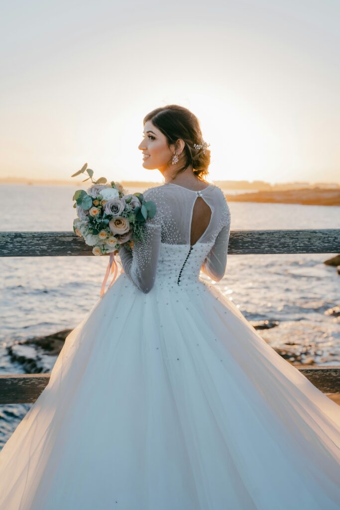 "Elegant bridal gown showcased at a New England fashion show."

